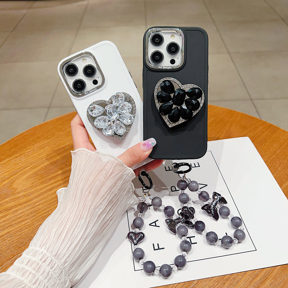 Stone Heart Shape Stand Silicone Soft Phone Cover with Bracelet - iPhone 16 Plus